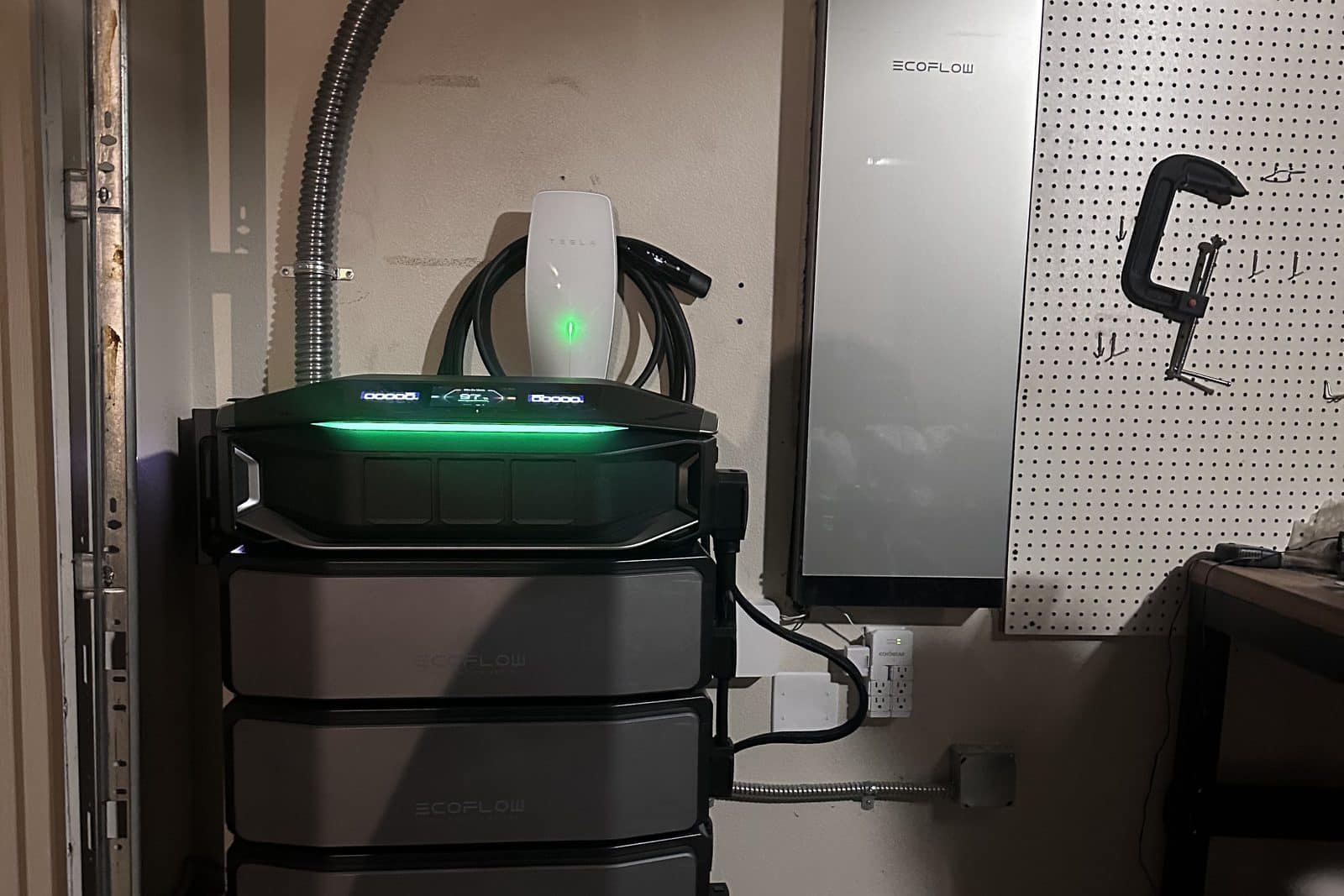 Whole-home battery backup system and Tesla Level 2 EV charger in a Vancouver, WA garage, installed by Power Professor