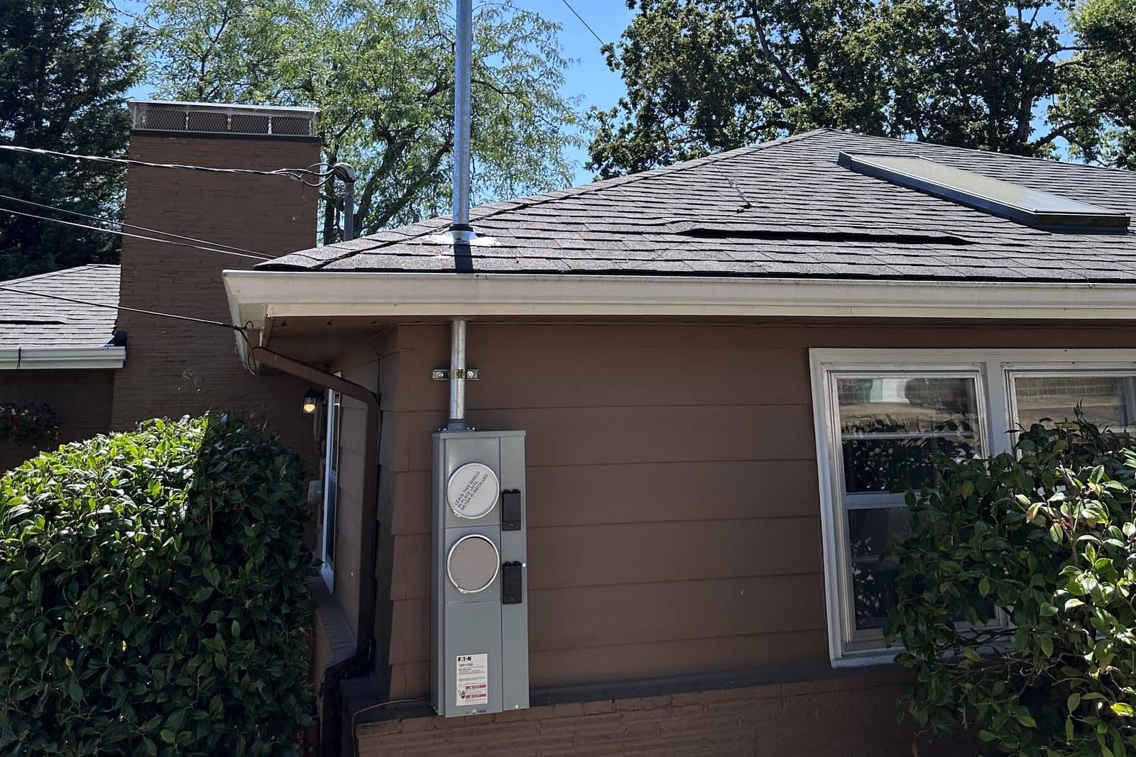 New service mast, weatherhead and meter base installed on a Portland-area home during a 200-amp service upgrade